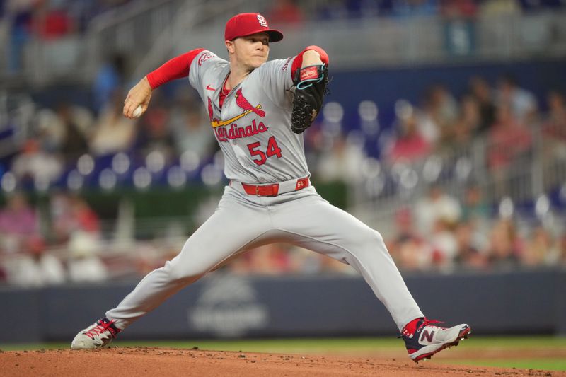 Jun 17, 2024; Miami, Florida, USA;  St. Louis Cardinals starting pitcher Sonny Gray (54) pitches in the first inning against the Miami Marlins at loanDepot Park. Mandatory Credit: Jim Rassol-USA TODAY Sports