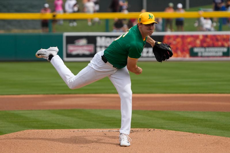 Mar 23, 2024; Mesa, Arizona, USA; Oakland Athletics starting pitcher Ross Stripling (36) throws against the Los Angeles Angels in the first inning at Hohokam Stadium. Mandatory Credit: Rick Scuteri-USA TODAY Sports