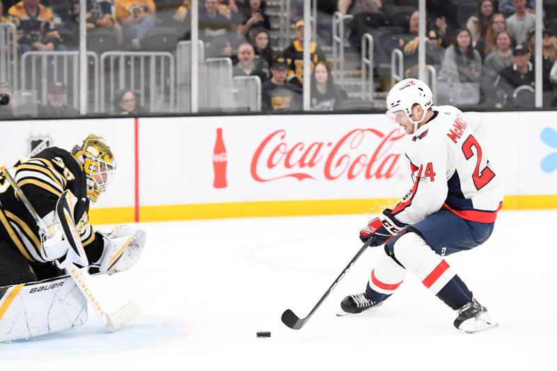 Oct 3, 2023; Boston, Massachusetts, USA; Washington Capitals defenseman Aaron Ness (42) breaks in alone on Boston Bruins goaltender Linus Ullmark (35) during overtime at TD Garden. Mandatory Credit: Bob DeChiara-USA TODAY Sports