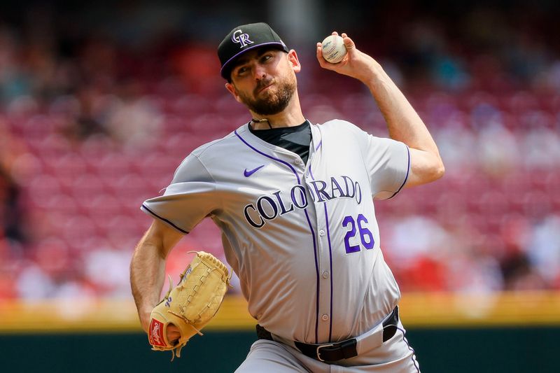 Jul 11, 2024; Cincinnati, Ohio, USA; Colorado Rockies starting pitcher Austin Gomber (26) pitches against the Cincinnati Reds in the first inning at Great American Ball Park. Mandatory Credit: Katie Stratman-USA TODAY Sports