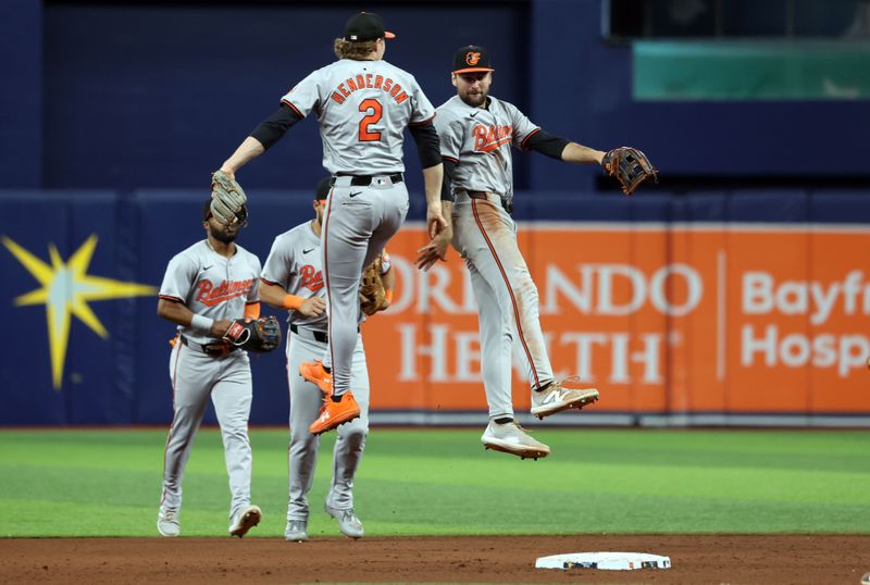 Jun 10, 2024; St. Petersburg, Florida, USA;Baltimore Orioles shortstop Gunnar Henderson (2) and third base Jordan Westburg (11) celebrates after they beat the Tampa Bay Rays at Tropicana Field. Mandatory Credit: Kim Klement Neitzel-USA TODAY Sports