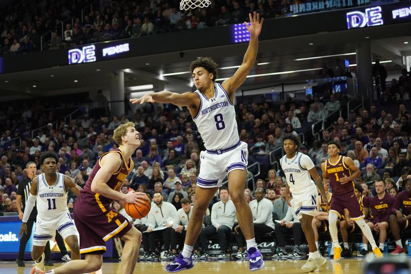 Jan 3, 2026; Evanston, Illinois, USA; Northwestern Wildcats guard Jordan Clayton (11) defends Minnesota Golden Gophers forward Cade Tyson (10) during the second half at Welsh-Ryan Arena. Mandatory Credit: David Banks-Imagn Images