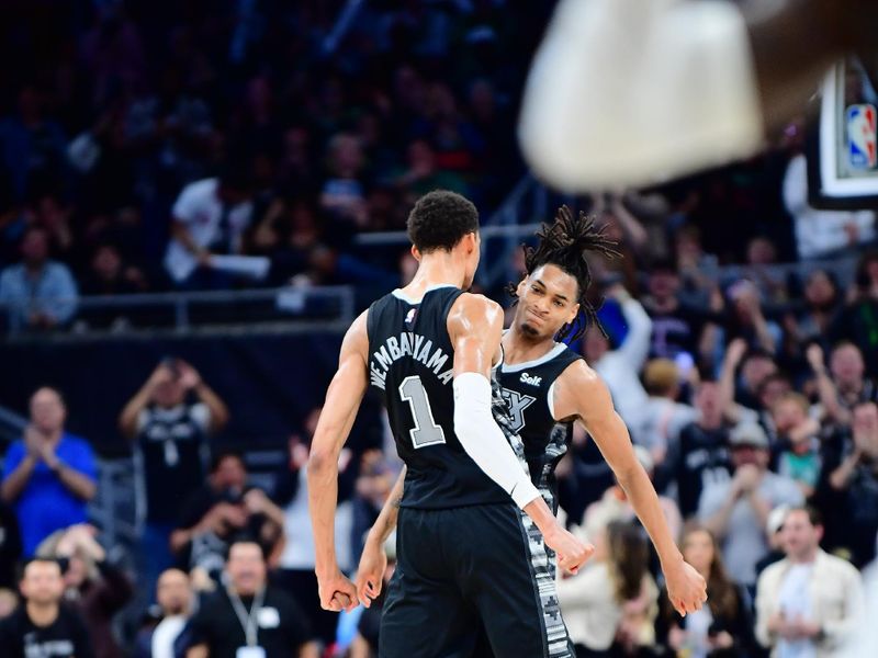 AUSTIN, TX - MARCH 17: Victor Wembanyama #1 of the San Antonio Spurs celebrates with Devin Vassell #24 during overtime of the game against the Brooklyn Nets on March 17, 2024 at the Moody Center in Austin, Texas. NOTE TO USER: User expressly acknowledges and agrees that, by downloading and or using this photograph, user is consenting to the terms and conditions of the Getty Images License Agreement. Mandatory Copyright Notice: Copyright 2024 NBAE (Photos by Michael Gonzales/NBAE via Getty Images)