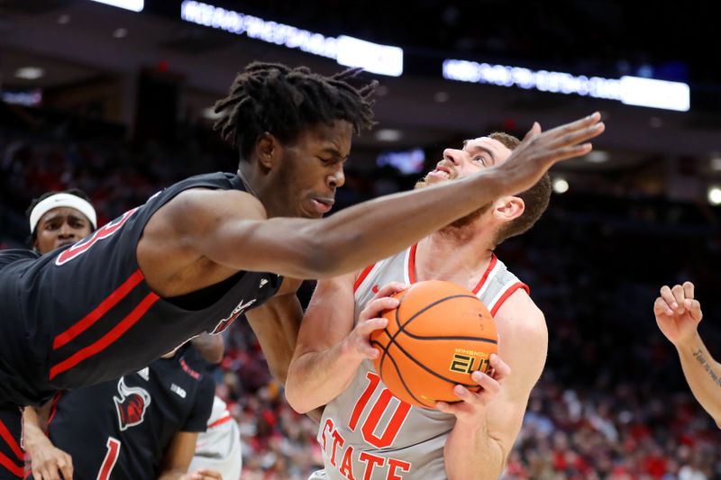 Jan 3, 2024; Columbus, Ohio, USA; Ohio State Buckeyes forward Jamison Battle (10) is fouled by Rutgers Scarlet Knights forward Antwone Woolfolk (13) during the second half at Value City Arena. Mandatory Credit: Joseph Maiorana-USA TODAY Sports