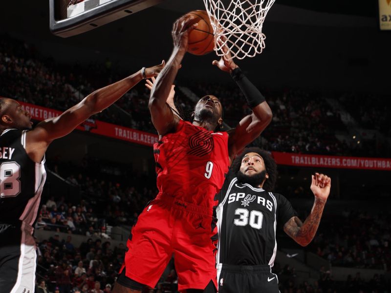 PORTLAND, OR - DECEMBER 13: Jerami Grant #9 of the Portland Trail Blazers drives to the basket during the game against the San Antonio Spurs on December 13, 2024 at the Moda Center Arena in Portland, Oregon. NOTE TO USER: User expressly acknowledges and agrees that, by downloading and or using this photograph, user is consenting to the terms and conditions of the Getty Images License Agreement. Mandatory Copyright Notice: Copyright 2024 NBAE (Photo by Cameron Browne/NBAE via Getty Images)