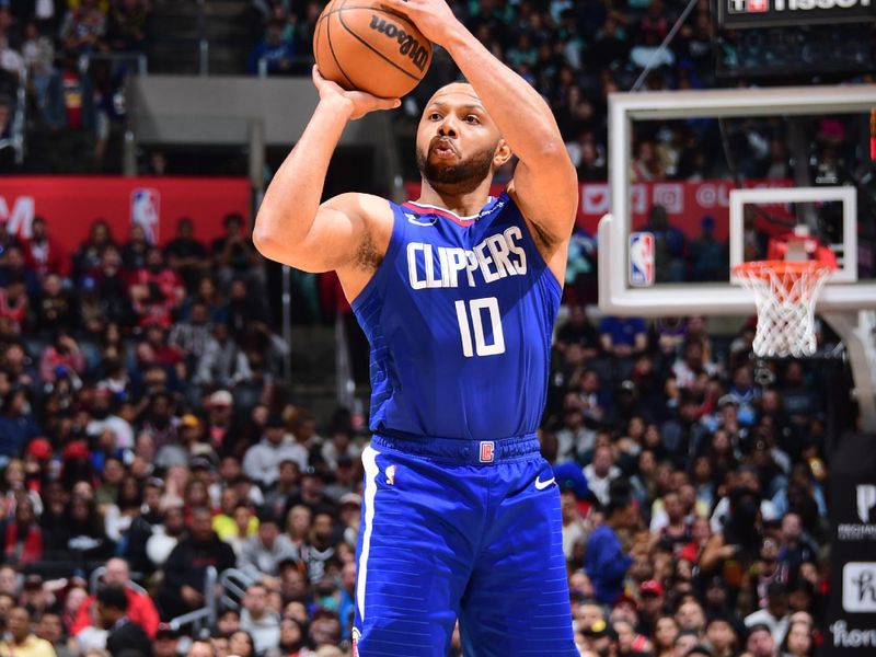 LOS ANGELES, CA - MARCH 27: Eric Gordon #10 of the LA Clippers shoots a three point basket during the game against the Chicago Bulls on March 27, 2023 at Crypto.Com Arena in Los Angeles, California. NOTE TO USER: User expressly acknowledges and agrees that, by downloading and/or using this Photograph, user is consenting to the terms and conditions of the Getty Images License Agreement. Mandatory Copyright Notice: Copyright 2023 NBAE (Photo by Adam Pantozzi/NBAE via Getty Images)