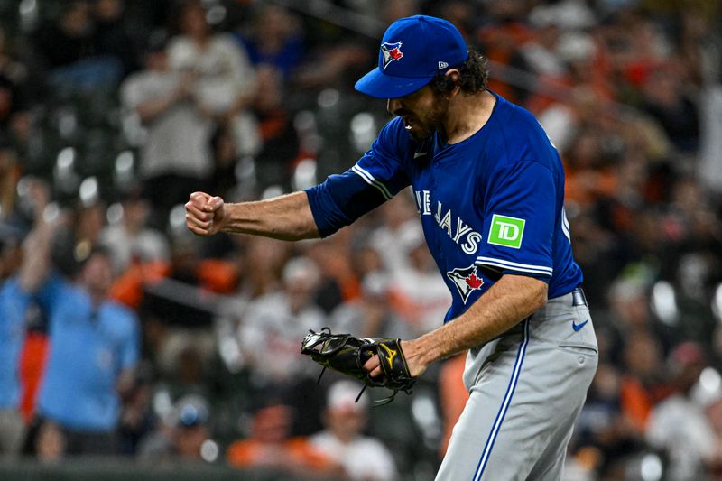 May 13, 2024; Baltimore, Maryland, USA;  Toronto Blue Jays pitcher Jordan Romano (68) reacts after the final out of the tenth inning against the Baltimore Orioles at Oriole Park at Camden Yards. Mandatory Credit: Tommy Gilligan-USA TODAY Sports