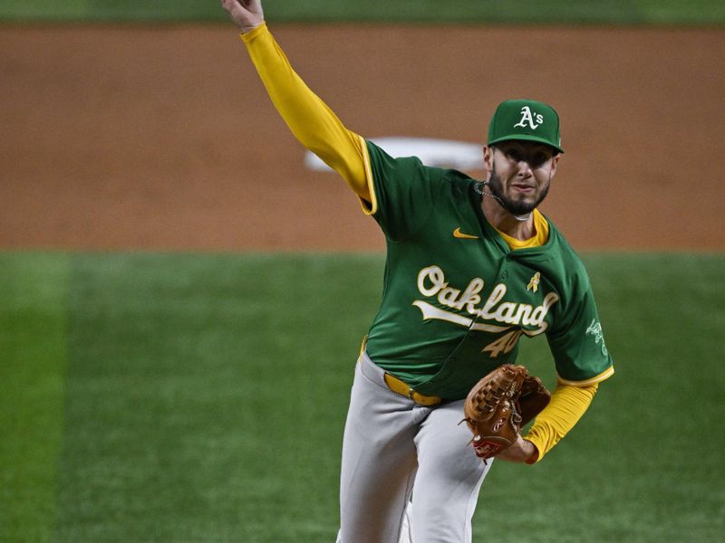 Sep 1, 2024; Arlington, Texas, USA; Oakland Athletics starting pitcher Mitch Spence (40) pitches against the Texas Rangers during the first inning at Globe Life Field. Mandatory Credit: Jerome Miron-USA TODAY Sports