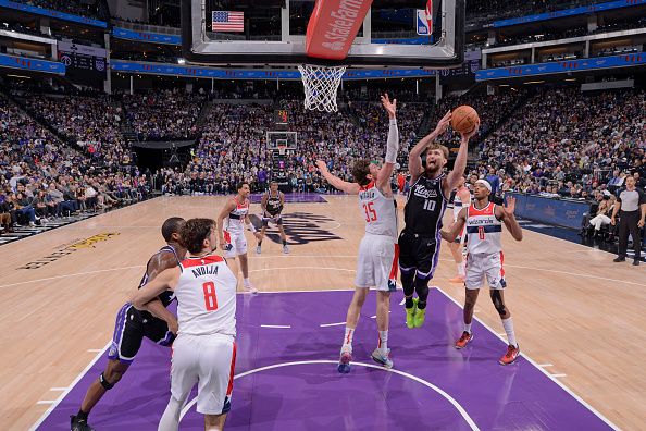 SACRAMENTO, CA - DECEMBER 18: Domantas Sabonis #10 of the Sacramento Kings drives to the basket during the game against the Washington Wizards on December 18, 2023 at Golden 1 Center in Sacramento, California. NOTE TO USER: User expressly acknowledges and agrees that, by downloading and or using this Photograph, user is consenting to the terms and conditions of the Getty Images License Agreement. Mandatory Copyright Notice: Copyright 2023 NBAE (Photo by Rocky Widner/NBAE via Getty Images)