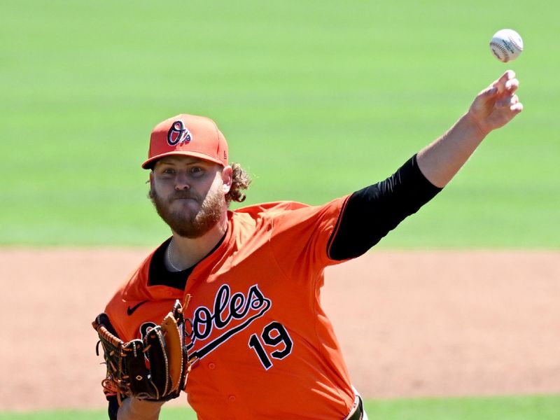 Mar 19, 2024; Dunedin, Florida, USA;  Baltimore Orioles starting pitcher Cole Irvin (19) throws a pitch in the second inning of the spring training game against the Toronto Blue Jays at TD Ballpark. Mandatory Credit: Jonathan Dyer-USA TODAY Sports