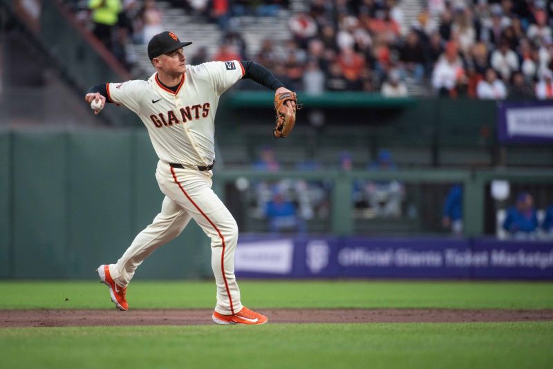 Apr 23, 2024; San Francisco, California, USA;  San Francisco Giants third base Matt Chapman (26) throws the ball to first base during the third inning at Oracle Park. Mandatory Credit: Ed Szczepanski-USA TODAY Sports