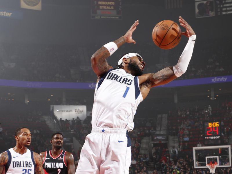 PORTLAND, OR - DECEMBER 1: Jaden Hardy #1 of the Dallas Mavericks rebounds the ball during the game against the Portland Trail Blazers on December 1, 2024 at the Moda Center Arena in Portland, Oregon. NOTE TO USER: User expressly acknowledges and agrees that, by downloading and or using this photograph, user is consenting to the terms and conditions of the Getty Images License Agreement. Mandatory Copyright Notice: Copyright 2024 NBAE (Photo by Cameron Browne/NBAE via Getty Images)