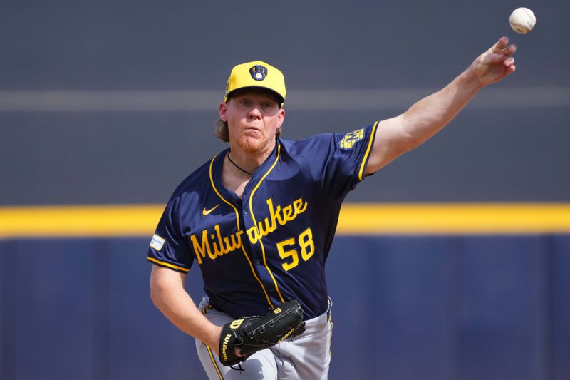 Feb 24, 2024; Peoria, Arizona, USA; Milwaukee Brewers pitcher Rob Zastrynzy (58) pitches against the San Diego Padres during the first inning of a Spring Training game at Peoria Sports Complex. Mandatory Credit: Joe Camporeale-USA TODAY Sports