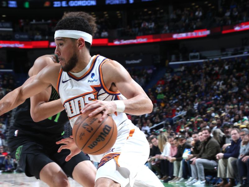 NEW ORLEANS, LA - JANUARY 19: Devin Booker #1 of the Phoenix Suns drives to the basket during the game against the New Orleans Pelicans on January 19, 2024 at the Smoothie King Center in New Orleans, Louisiana. NOTE TO USER: User expressly acknowledges and agrees that, by downloading and or using this Photograph, user is consenting to the terms and conditions of the Getty Images License Agreement. Mandatory Copyright Notice: Copyright 2024 NBAE (Photo by Layne Murdoch Jr./NBAE via Getty Images)