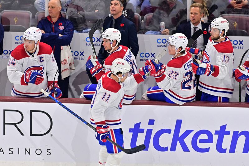 Nov 2, 2023; Tempe, Arizona, USA;  Montreal Canadiens right wing Brendan Gallagher (11) celebrates with teammates after scoring a goal in the third period against the Arizona Coyotes at Mullett Arena. Mandatory Credit: Matt Kartozian-USA TODAY Sports