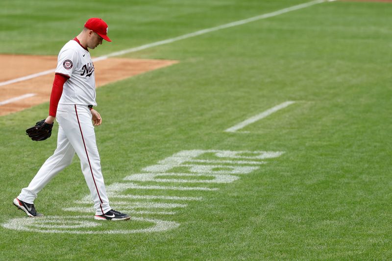 Sep 26, 2024; Washington, District of Columbia, USA; Washington Nationals pitcher Patrick Corbin (46) walks off the field against the Kansas City Royals during the sixth inning after being removed from the game in what is likely his final start for the Nationals at Nationals Park. Mandatory Credit: Geoff Burke-Imagn Images