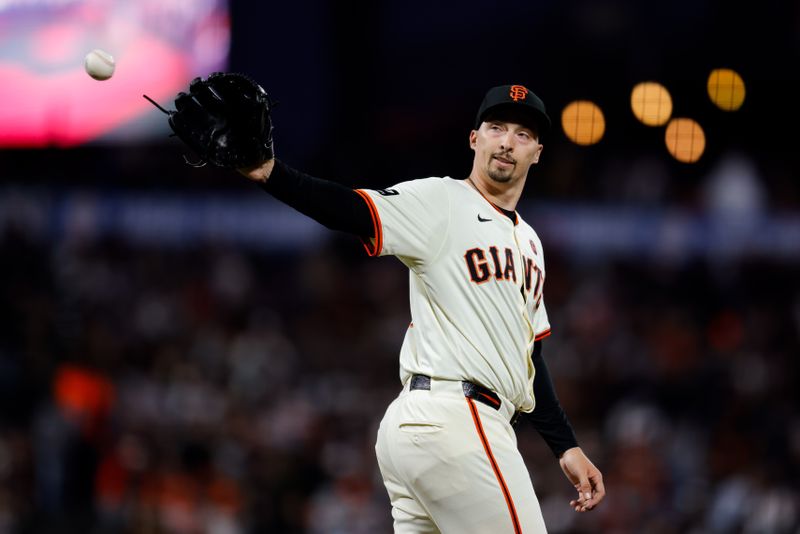 Aug 12, 2024; San Francisco, California, USA; San Francisco Giants pitcher Blake Snell (7) reacts after giving up a double to Atlanta Braves designated hitter Marcell Ozuna (20) during the seventh inning at Oracle Park. Mandatory Credit: Sergio Estrada-USA TODAY Sports