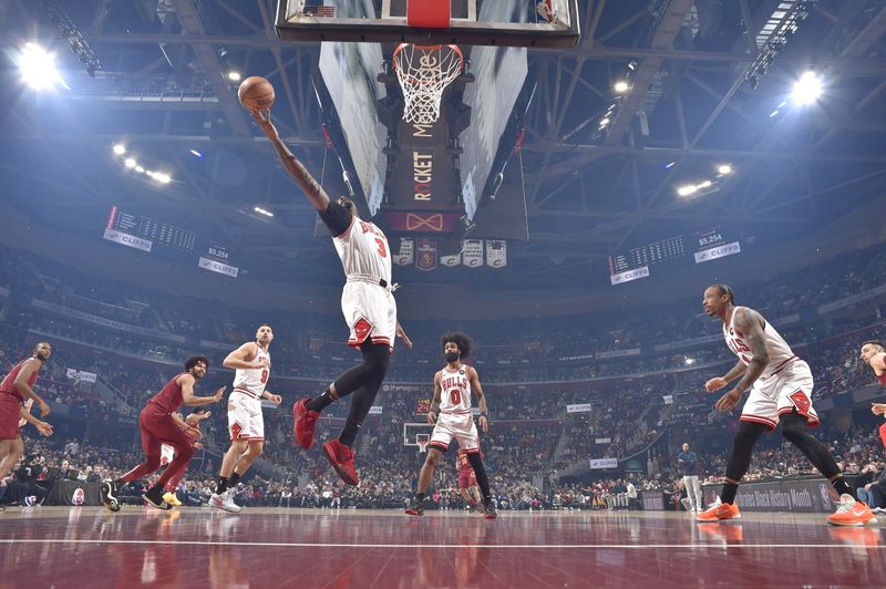 CLEVELAND, OH - FEBRUARY 14: Andre Drummond #3 of the Chicago Bulls grabs the rebound during the game against the Cleveland Cavaliers on February 14, 2024 at Rocket Mortgage FieldHouse in Cleveland, Ohio. NOTE TO USER: User expressly acknowledges and agrees that, by downloading and/or using this Photograph, user is consenting to the terms and conditions of the Getty Images License Agreement. Mandatory Copyright Notice: Copyright 2024 NBAE (Photo by David Liam Kyle/NBAE via Getty Images)