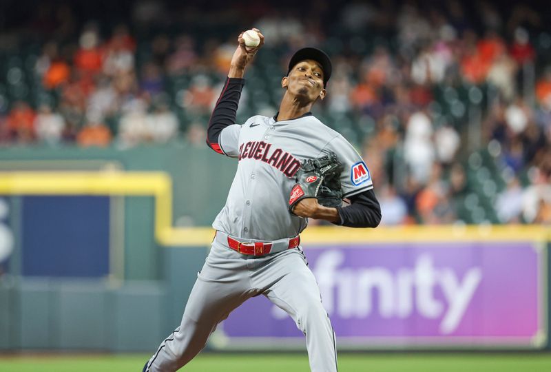 May 1, 2024; Houston, Texas, USA;  Cleveland Guardians starting pitcher Triston McKenzie (24) delivers a pitch during the second inning against the Houston Astros at Minute Maid Park. Mandatory Credit: Troy Taormina-USA TODAY Sports