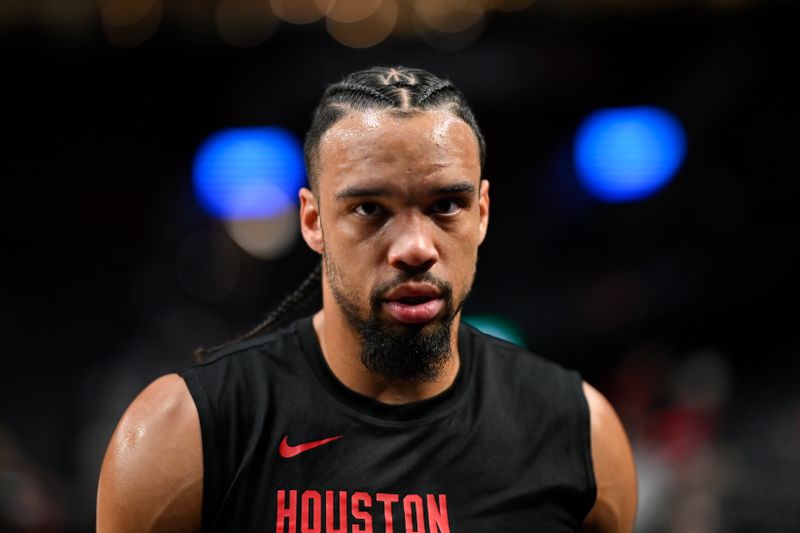 PORTLAND, OREGON - MARCH 08: Dillon Brooks #9 of the Houston Rockets looks on before the game against the Portland Trail Blazers at the Moda Center on March 08, 2024 in Portland, Oregon. NOTE TO USER: User expressly acknowledges and agrees that, by downloading and or using this photograph, User is consenting to the terms and conditions of the Getty Images License Agreement. (Photo by Alika Jenner/Getty Images)