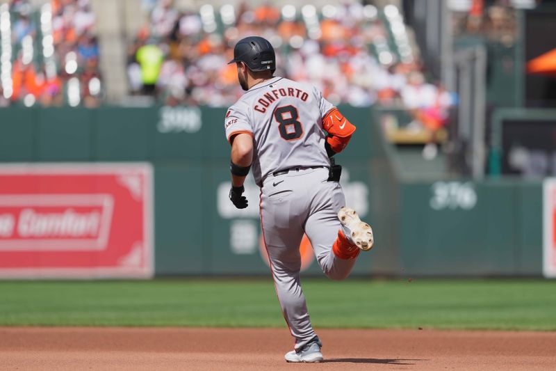 Sep 19, 2024; Baltimore, Maryland, USA; San Francisco Giants outfielder Michael Conforto (8) rounds the bases following his two run home run in the second inning against the Baltimore Orioles at Oriole Park at Camden Yards. Mandatory Credit: Mitch Stringer-Imagn Images