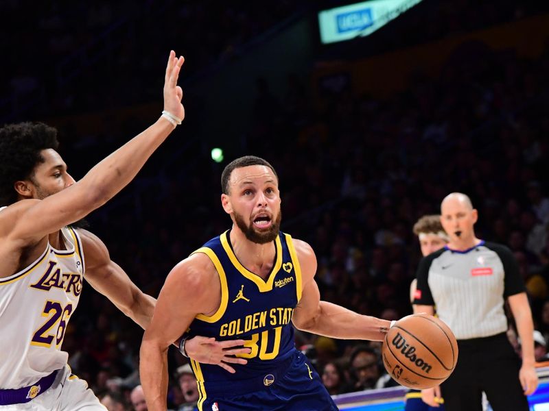 LOS ANGELES, CA - MACH 16: Stephen Curry #30 of the Golden State Warriors dribbles the ball during the game against the Los Angeles Lakers on March 16, 2024 at Crypto.Com Arena in Los Angeles, California. NOTE TO USER: User expressly acknowledges and agrees that, by downloading and/or using this Photograph, user is consenting to the terms and conditions of the Getty Images License Agreement. Mandatory Copyright Notice: Copyright 2024 NBAE (Photo by Adam Pantozzi/NBAE via Getty Images)