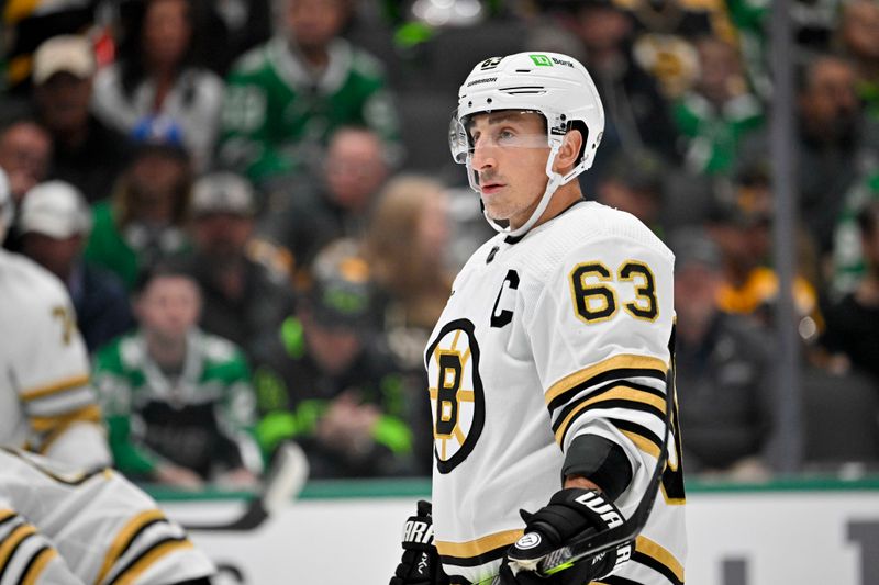 Nov 6, 2023; Dallas, Texas, USA; Boston Bruins left wing Brad Marchand (63) waits for the face-off against the Dallas Stars during the first period at the American Airlines Center. Mandatory Credit: Jerome Miron-USA TODAY Sports