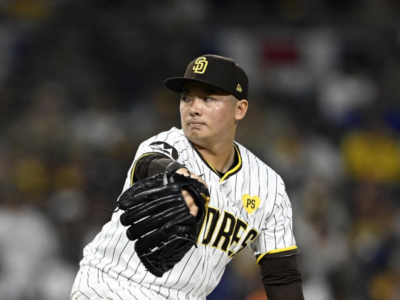 Oct 9, 2024; San Diego, California, USA; San Diego Padres pitcher Yuki Matsui (1) throws in the ninth inning against the Los Angeles Dodgers during game four of the NLDS for the 2024 MLB Playoffs at Petco Park.  Mandatory Credit: Denis Poroy-Imagn Images