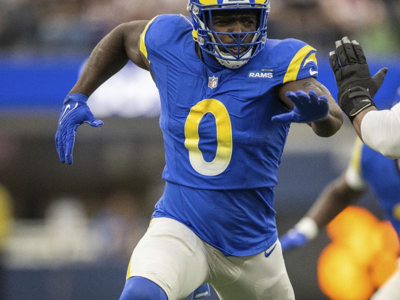 Los Angeles Rams linebacker Byron Young (0) runs during an NFL football game against the Washington Commanders, Sunday, Dec. 17, 2023, in Inglewood, Calif. (AP Photo/Kyusung Gong)