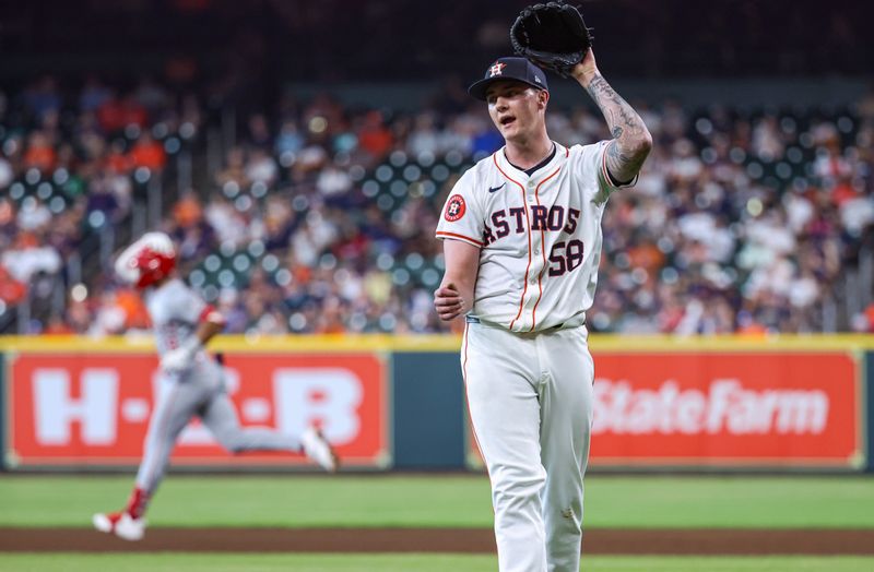 May 22, 2024; Houston, Texas, USA; Houston Astros starting pitcher Hunter Brown (58) reacts and Los Angeles Angels second baseman Kyren Paris (19) rounds the bases after hitting a two-run home run during the fifth inning at Minute Maid Park. Mandatory Credit: Troy Taormina-USA TODAY Sports