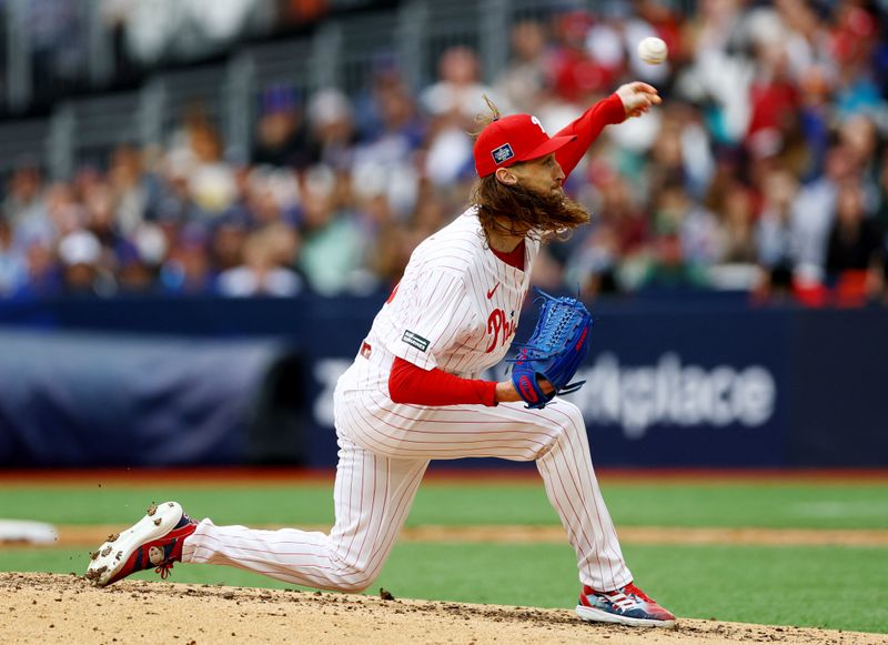 [US, Mexico & Canada customers only] June 9, 2024; London, UNITED KINGDOM;  Philadelphia Phillies pitcher Matt Strahm throws to the New York Mets during a London Series baseball game at Queen Elizabeth Olympic Park. Mandatory Credit: Matthew Childs/Reuters via USA TODAY Sports