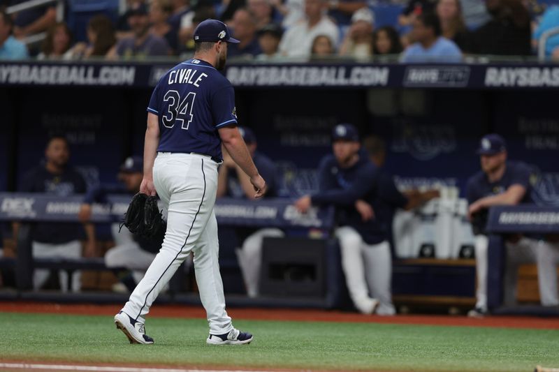 Sep 9, 2023; St. Petersburg, Florida, USA;  Tampa Bay Rays starting pitcher Aaron Civale (34) walks off the field after pitching the first inning against the Seattle Mariners at Tropicana Field. Mandatory Credit: Nathan Ray Seebeck-USA TODAY Sports