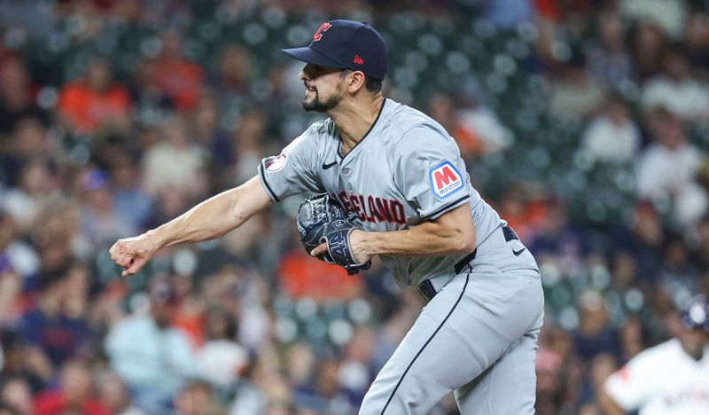 May 2, 2024; Houston, Texas, USA; Cleveland Guardians relief pitcher Nick Sandlin (52) delivers a pitch during the sixth inning against the Houston Astros at Minute Maid Park. Mandatory Credit: Troy Taormina-USA TODAY Sports