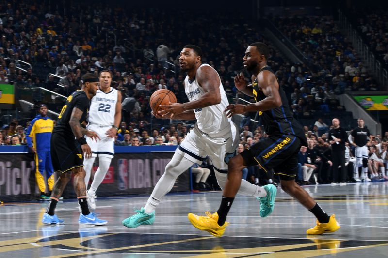 SAN FRANCISCO, CA - NOVEMBER 15: Marcus Smart #36 of the Memphis Grizzlies drives to the basket during the game against the Golden State Warriors during the Emirates NBA Cup game on November 15, 2024 at Chase Center in San Francisco, California. NOTE TO USER: User expressly acknowledges and agrees that, by downloading and or using this photograph, user is consenting to the terms and conditions of Getty Images License Agreement. Mandatory Copyright Notice: Copyright 2024 NBAE (Photo by Noah Graham/NBAE via Getty Images)