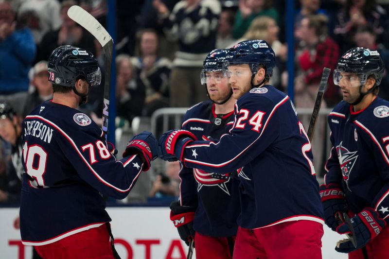 Oct 22, 2024; Columbus, Ohio, USA; Columbus Blue Jackets right wing Mathieu Olivier (24) celebrates with teammates after scoring a goal against the Toronto Maple Leafs during the second period at Nationwide Arena. Mandatory Credit: Aaron Doster-Imagn Images