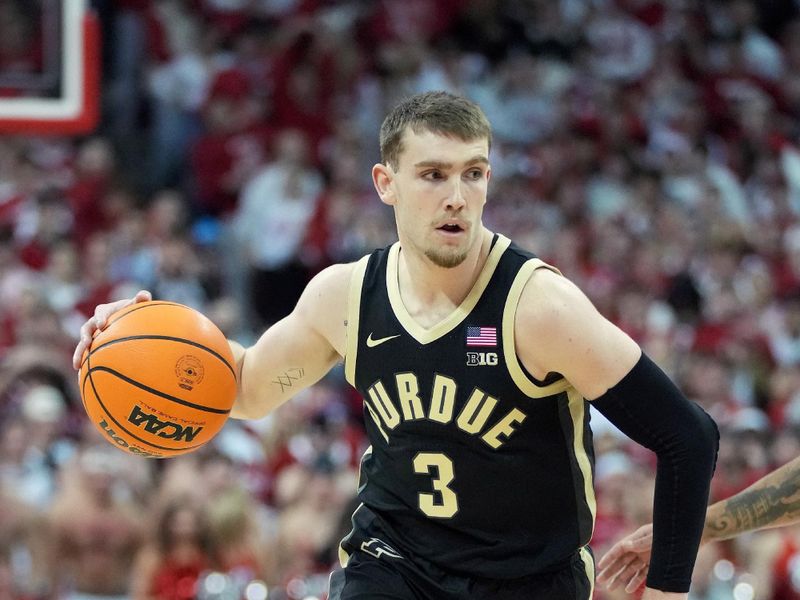 Feb 4, 2024; Madison, Wisconsin, USA; Purdue Boilermakers guard Braden Smith (3) dribbles the ball during the first half against the Wisconsin Badgers at the Kohl Center. Mandatory Credit: Kayla Wolf-USA TODAY Sports