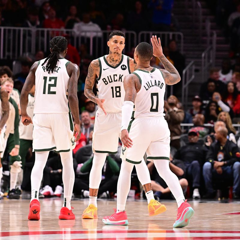 ATLANTA, GA - MARCH 4: Kyle Kuzma #18 of the Milwaukee Bucks high fives Damian Lillard #0 during the game against the Atlanta Hawks on March 4, 2025 at State Farm Arena in Atlanta, Georgia. NOTE TO USER: User expressly acknowledges and agrees that, by downloading and/or using this Photograph, user is consenting to the terms and conditions of the Getty Images License Agreement. Mandatory Copyright Notice: Copyright 2025 NBAE(Photo by Adam Hagy/NBAE via Getty Images)