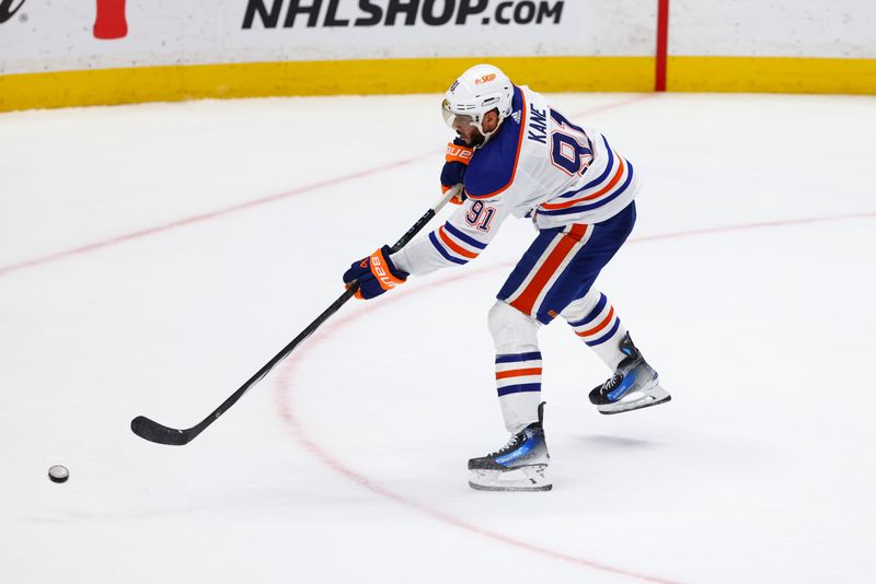 Feb 9, 2024; Anaheim, California, USA; Edmonton Oilers left wing Evander Kane (91) scores a goal during the third period of a game against the Anaheim Ducks at Honda Center. Mandatory Credit: Jessica Alcheh-USA TODAY Sports