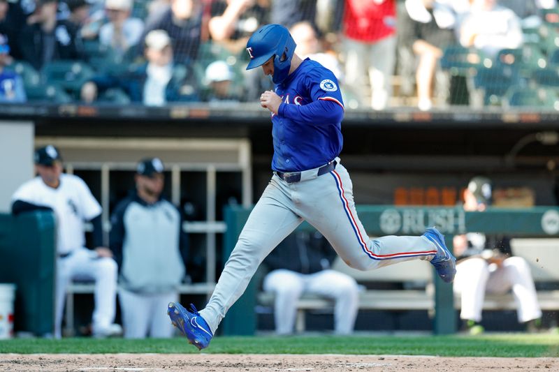 May 24, 2025; Chicago, Illinois, USA; Texas Rangers left fielder Wyatt Langford (36) scores against the Chicago White Sox during the fifth inning at Rate Field. Mandatory Credit: Kamil Krzaczynski-Imagn Images