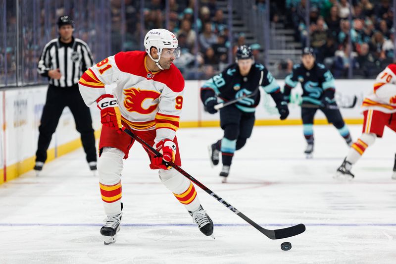 Oct 19, 2024; Seattle, Washington, USA; Calgary Flames center Nazem Kadri (91) skates against the Seattle Kraken during the second period at Climate Pledge Arena. Mandatory Credit: Caean Couto-Imagn Images