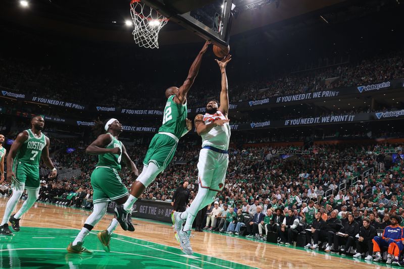 BOSTON, MA - OCTOBER 22: Karl-Anthony Towns #32 of the New York Knicks drives to the basket during the game against the Boston Celtics on October 22, 2024 at TD Garden in Boston, Massachusetts. NOTE TO USER: User expressly acknowledges and agrees that, by downloading and or using this Photograph, user is consenting to the terms and conditions of the Getty Images License Agreement. Mandatory Copyright Notice: Copyright 2024 NBAE (Photo by Nathaniel S. Butler/NBAE via Getty Images)