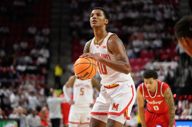 Dec 4, 2024; College Park, Maryland, USA; Maryland Terrapins forward Julian Reese (10) shoots a free throw during the second half against the Ohio State Buckeyes at Xfinity Center. Mandatory Credit: Reggie Hildred-Imagn Images