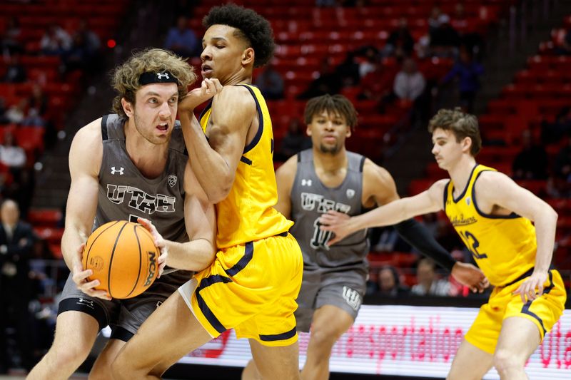 Feb 5, 2023; Salt Lake City, Utah, USA; Utah Utes guard Jaxon Brenchley (5) drives against California Golden Bears forward Monty Bowser (2) in the second half at Jon M. Huntsman Center. Mandatory Credit: Jeffrey Swinger-USA TODAY Sports