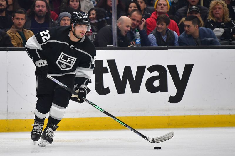 Feb 13, 2023; Los Angeles, California, USA; Los Angeles Kings left wing Kevin Fiala (22) controls the puck against the Buffalo Sabres during the second period at Crypto.com Arena. Mandatory Credit: Gary A. Vasquez-USA TODAY Sports