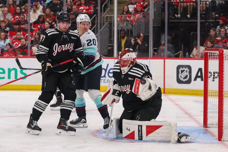Jan 14, 2026; Newark, New Jersey, USA; New Jersey Devils goaltender Jacob Markstrom (25) makes a save against the Seattle Kraken during the third period at Prudential Center. Mandatory Credit: Ed Mulholland-Imagn Images