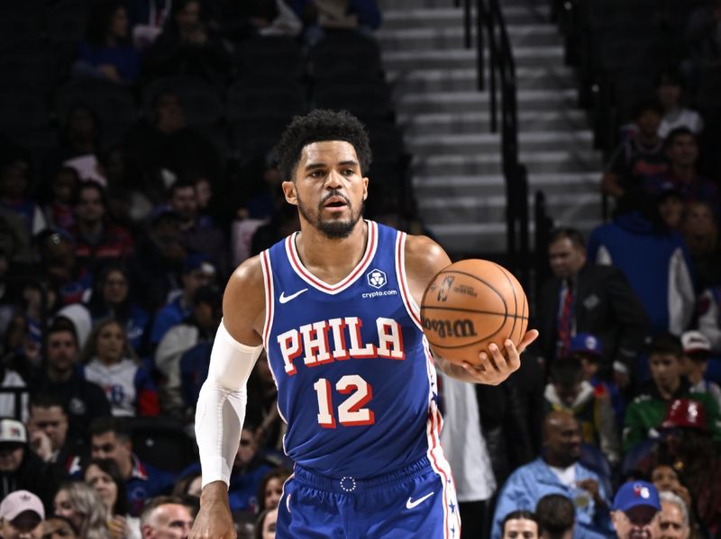 PHILADELPHIA, PA - MARCH 6:  Tobias Harris #12 of the Philadelphia 76ers handles the ball during the game against the Memphis Grizzlies on March 6, 2024 at the Wells Fargo Center in Philadelphia, Pennsylvania NOTE TO USER: User expressly acknowledges and agrees that, by downloading and/or using this Photograph, user is consenting to the terms and conditions of the Getty Images License Agreement. Mandatory Copyright Notice: Copyright 2024 NBAE (Photo by David Dow/NBAE via Getty Images)