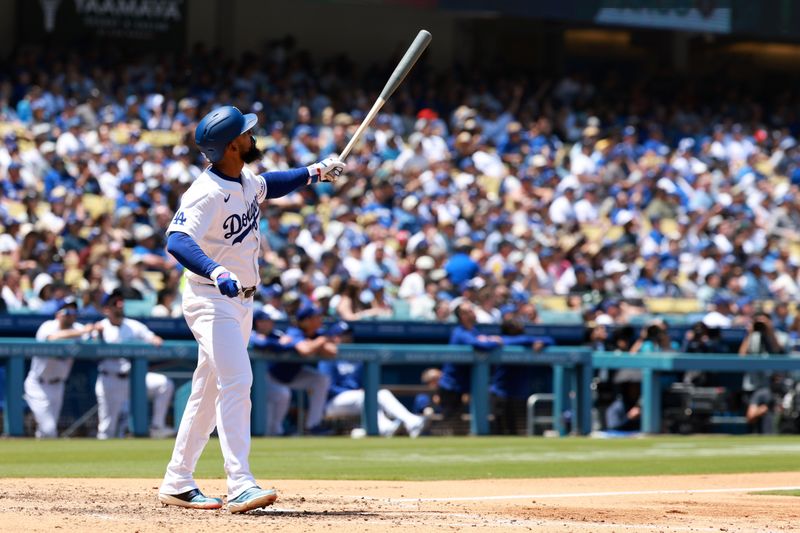 May 8, 2024; Los Angeles, California, USA;  Los Angeles Dodgers outfielder Teoscar Hernandez (37) hits a two-run home run during the sixth inning against the Miami Marlins at Dodger Stadium. Mandatory Credit: Kiyoshi Mio-USA TODAY Sports