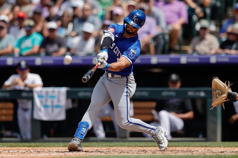 Jul 7, 2024; Denver, Colorado, USA; Kansas City Royals left fielder MJ Melendez (1) hits a solo home run in the seventh inning against the Colorado Rockies at Coors Field. Mandatory Credit: Isaiah J. Downing-USA TODAY Sports