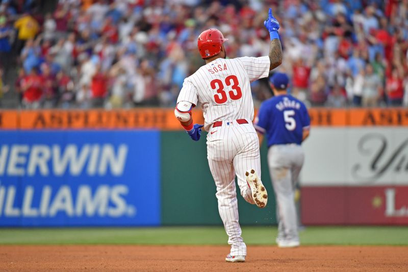 May 22, 2024; Philadelphia, Pennsylvania, USA; Philadelphia Phillies shortstop Edmundo Sosa (33) celebrates his three run home run against the Texas Rangers during the fourth inning at Citizens Bank Park. Mandatory Credit: Eric Hartline-USA TODAY Sports