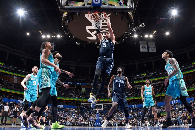 ORLANDO, FL - MARCH 19: Moritz Wagner #21 of the Orlando Magic dunks the ball during the game against the Charlotte Hornets on March 19, 2024 at the Kia Center in Orlando, Florida. NOTE TO USER: User expressly acknowledges and agrees that, by downloading and or using this photograph, User is consenting to the terms and conditions of the Getty Images License Agreement. Mandatory Copyright Notice: Copyright 2024 NBAE (Photo by Fernando Medina/NBAE via Getty Images)